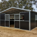 Cost-effective horse facility infrastructure showing galvanized steel stable construction designed for optimal horse facility ROI Australia in commercial operations.