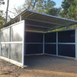 Prefabricated horse barn shelter with durable galvanized steel and HDPE panels ideal for Australian horse farms.