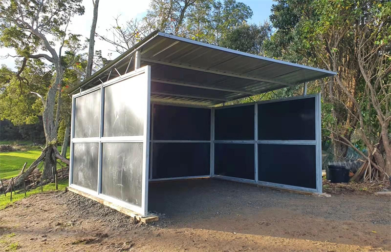 Prefabricated horse barn shelter with durable galvanized steel and HDPE panels ideal for Australian horse farms.