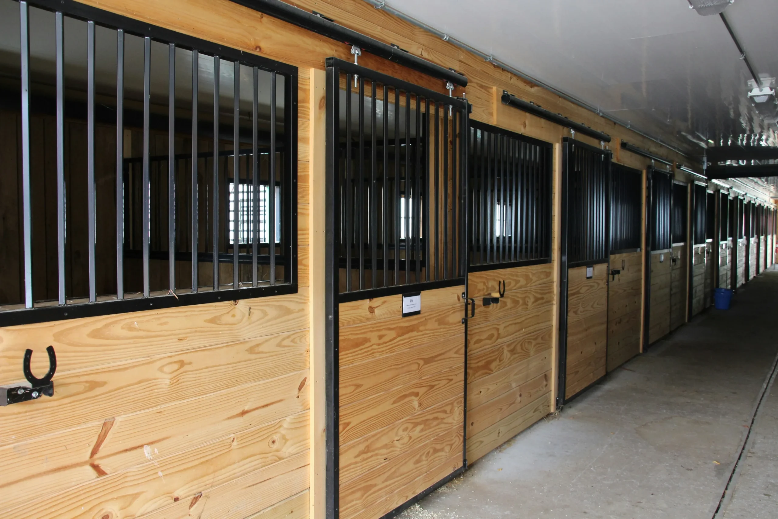 Roof eave ventilation gap on a horse stable for tack room airflow planning