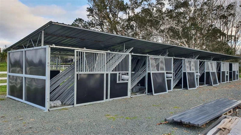 Flat pack portable horse stables designed for the ANZ market, showcasing the durable galvanized steel and HDPE construction ready for export to equestrian facilities.