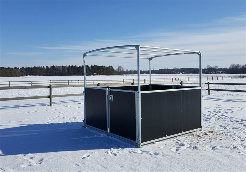 DB Stable manufactures durable Portable Horse Stables for ANZ markets using hot-dip galvanized steel frames and UV-resistant HDPE panels. This image shows a standalone unit installed in a snowy field, demonstrating the structural integrity of our high-quality DIY stable kits.