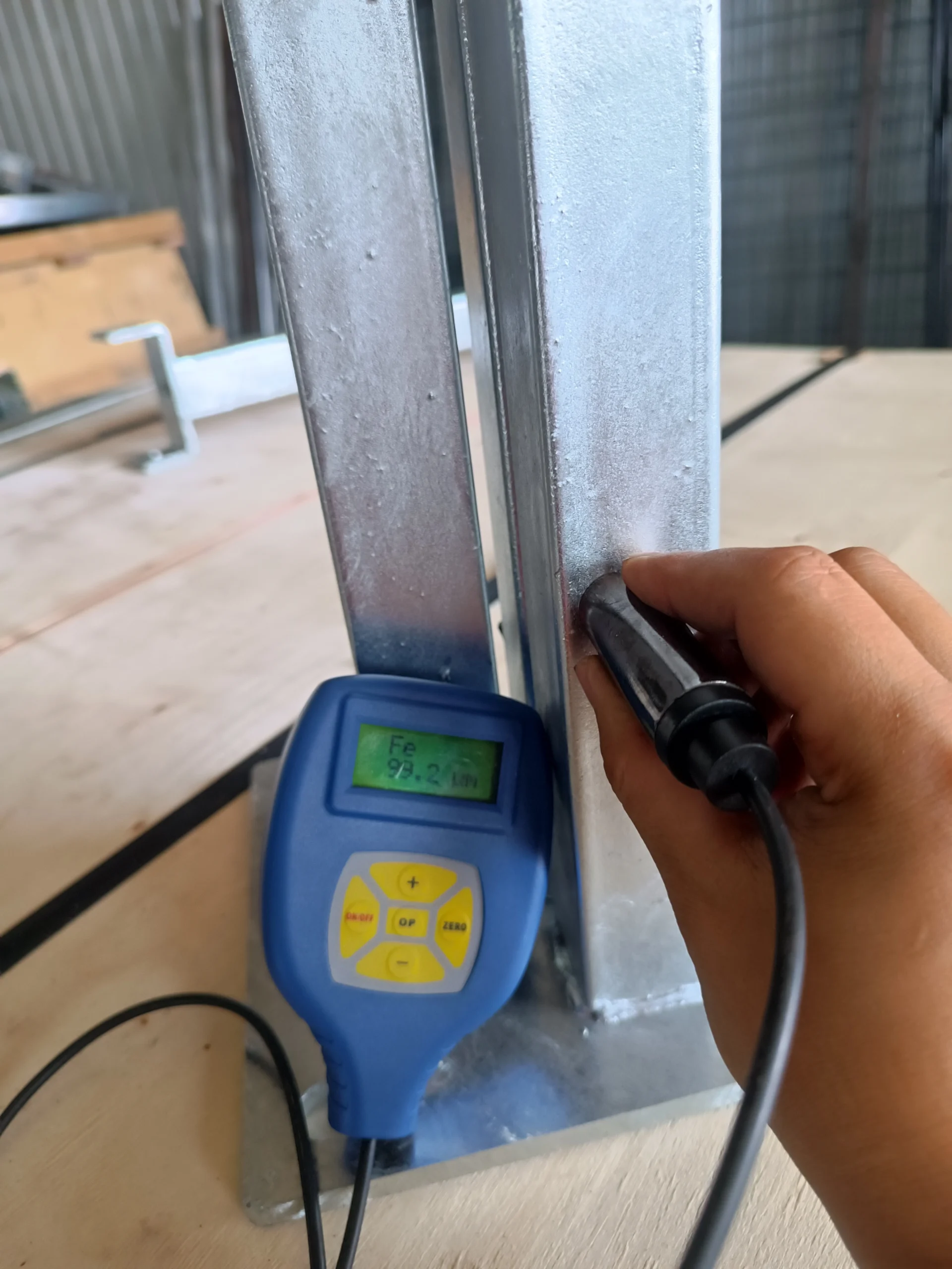 Technical quality control measurement of the heavy-duty hot-dip galvanized steel frame used in DB Stable's durable portable horse stables for the Australian and New Zealand markets.