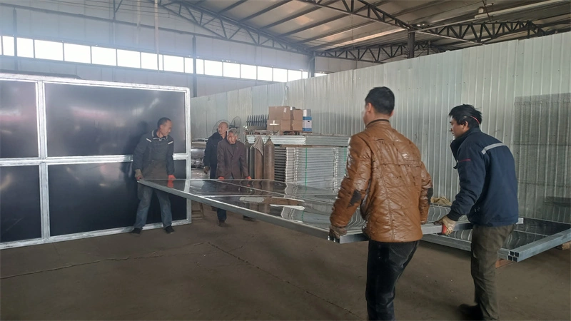 Hot-dip galvanised stable panels in manufacturing at a portable horse stable factory