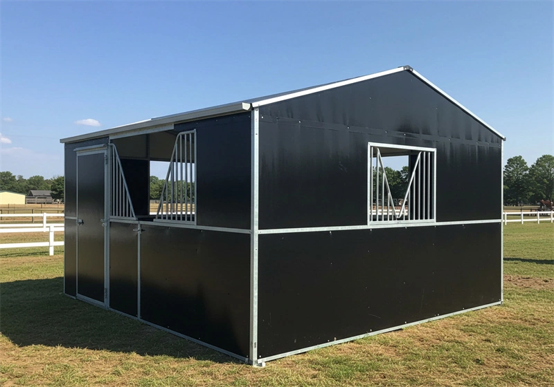 Black prefabricated stall with galvanized steel framing, demonstrating the durability of our portable horse stables for ANZ. This custom stable design ensures secure and professional housing for equestrian facilities.