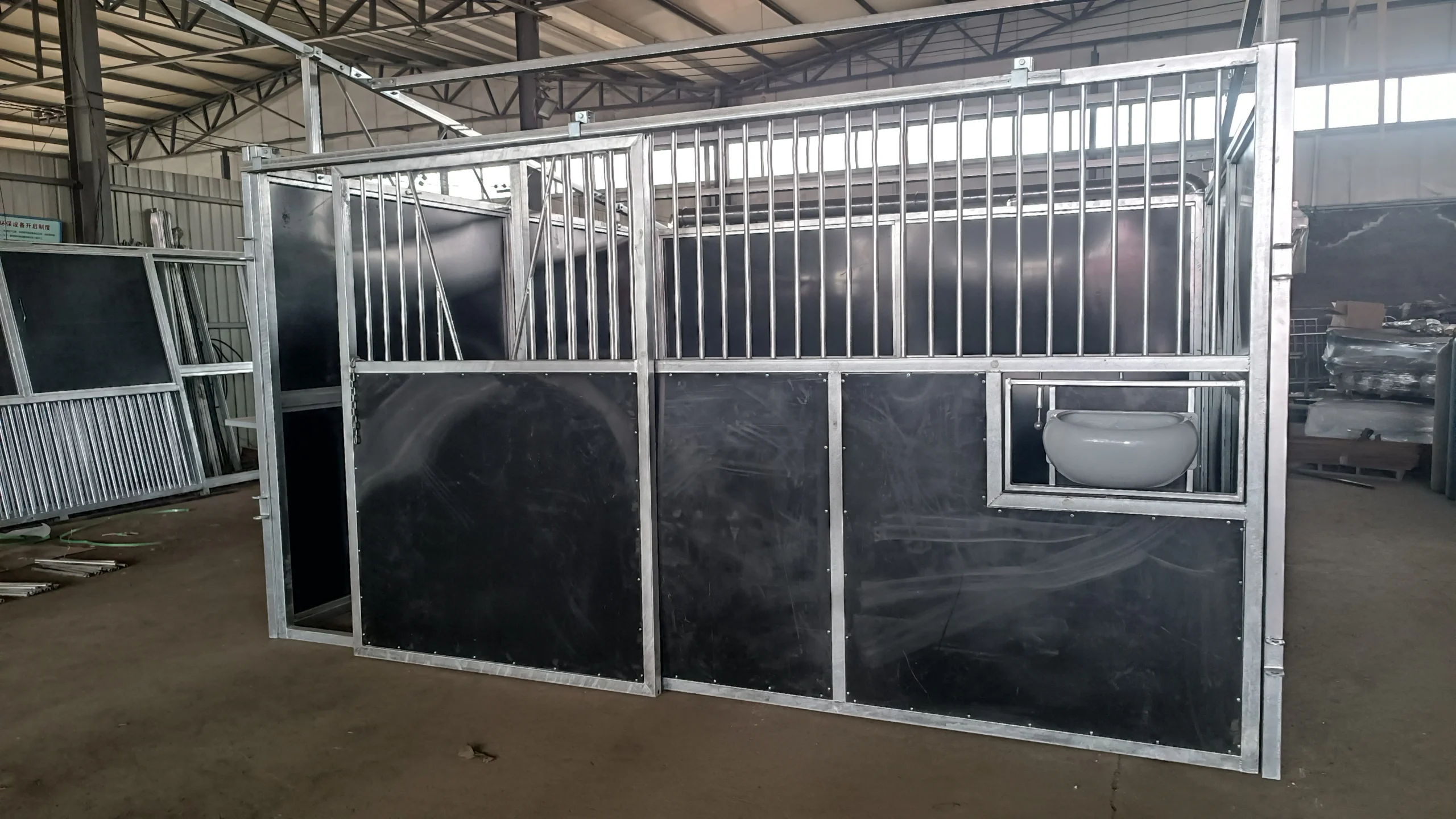 DB Stable manufacturer produces durable portable horse stables for ANZ markets featuring hot-dip galvanized frames and 10mm UV-resistant HDPE panels.